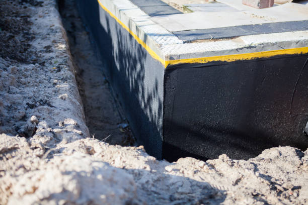 Professional Waterproofing technician working in Millbury, OH